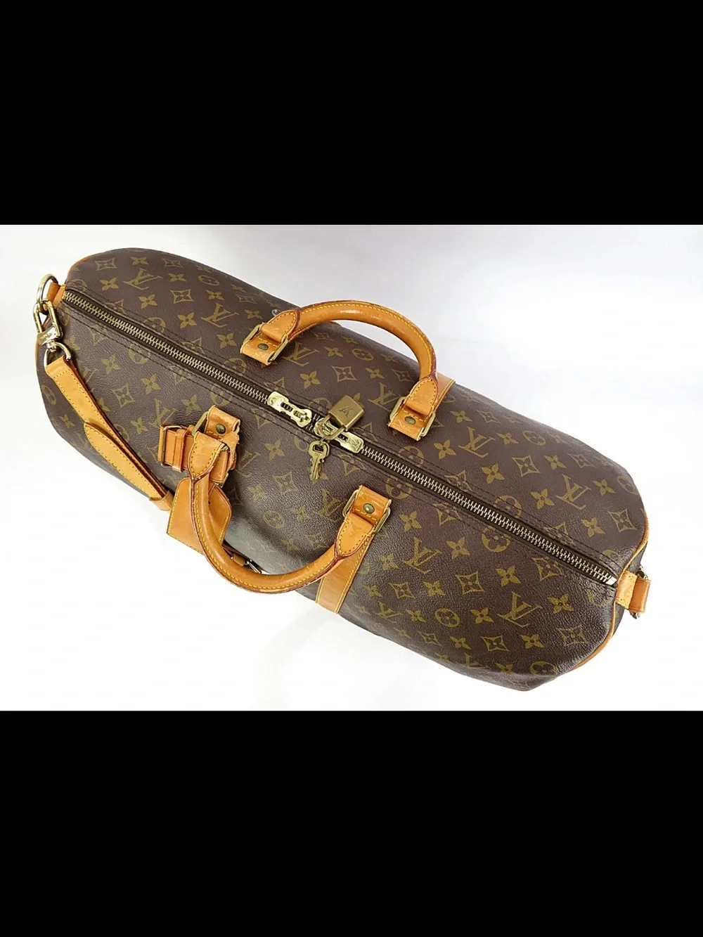 Louis Vuitton Monogram Canvas Travel Duffel in Brown and Tan